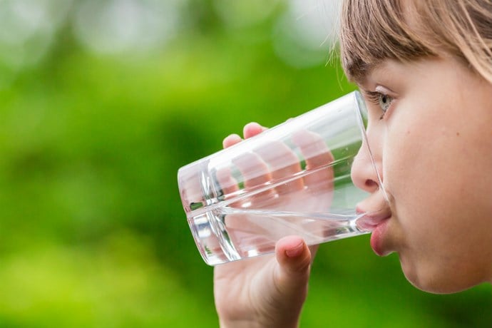 Girl drinking tap water.jpg